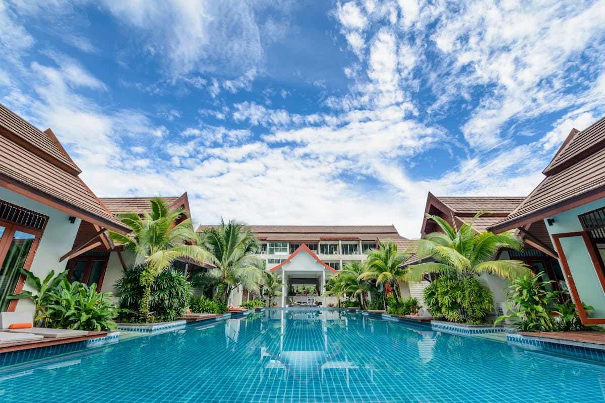 Tropical residence — layered greenery and soft shadow